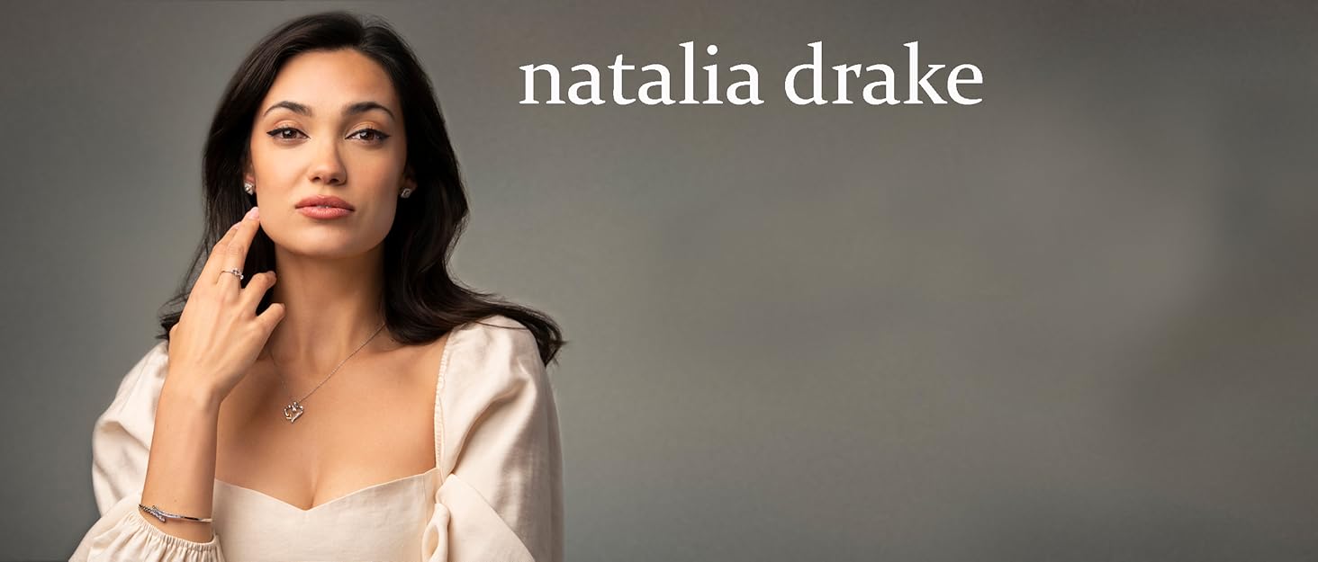 natalia drake model wearing diamond earrings necklace and ring