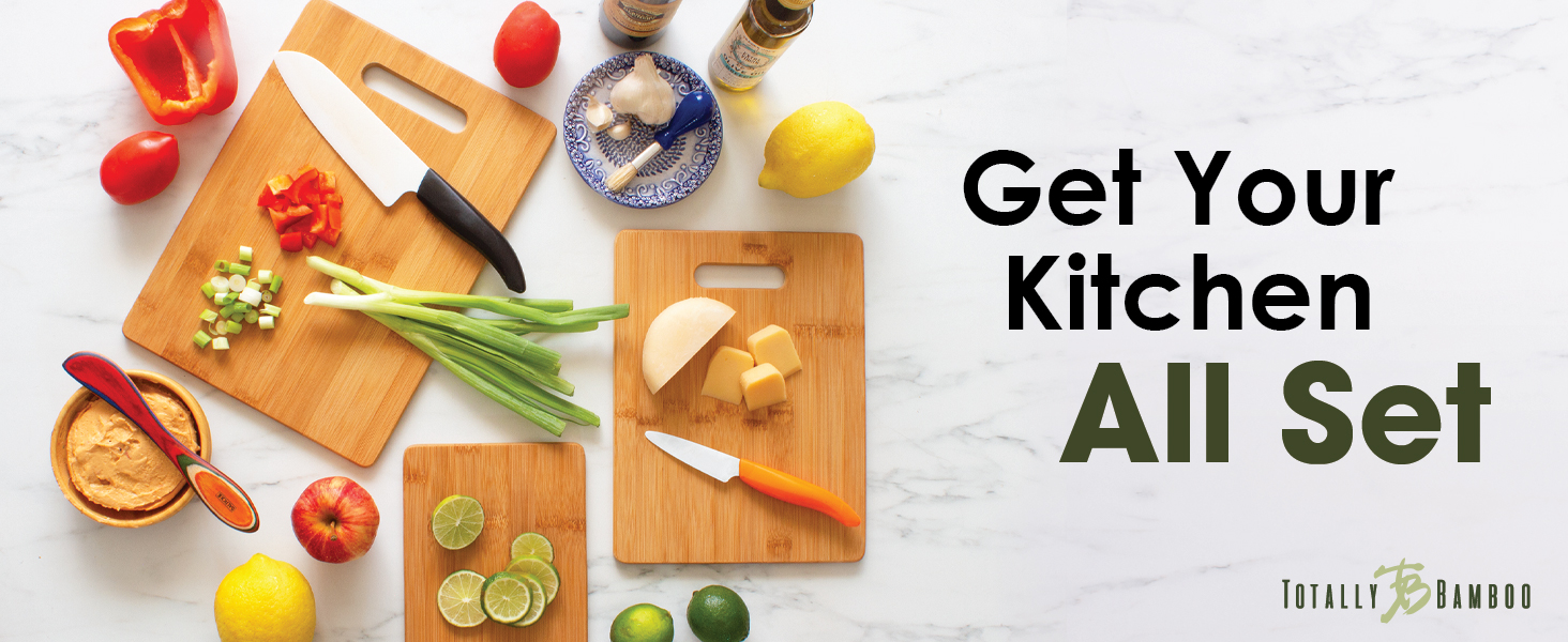 Three bamboo cutting board set with sliced food