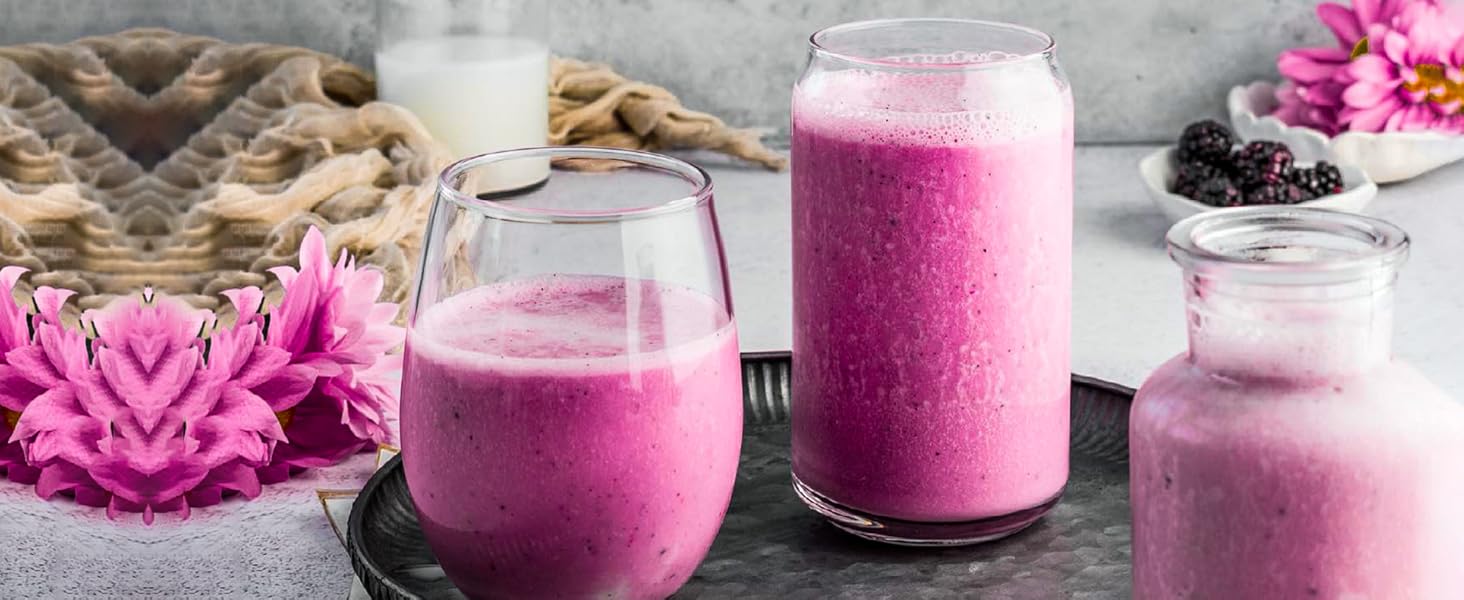 can glass filled with smoothie and fruits with it
