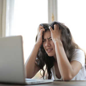 pull hair frustration laptop