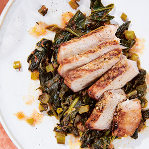  Tea-Brined Pork Chops with Braised Greens and Tomatoes